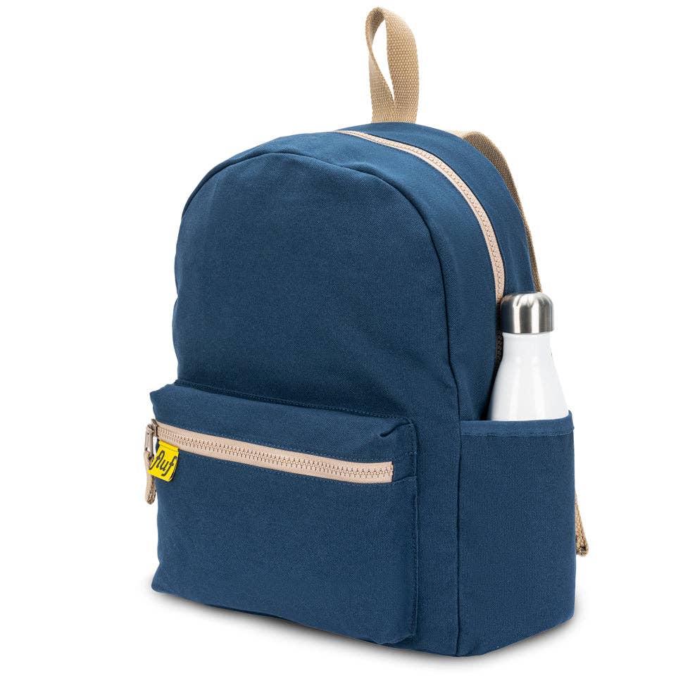 Blue backpack with a white water bottle in a pocket on a white background