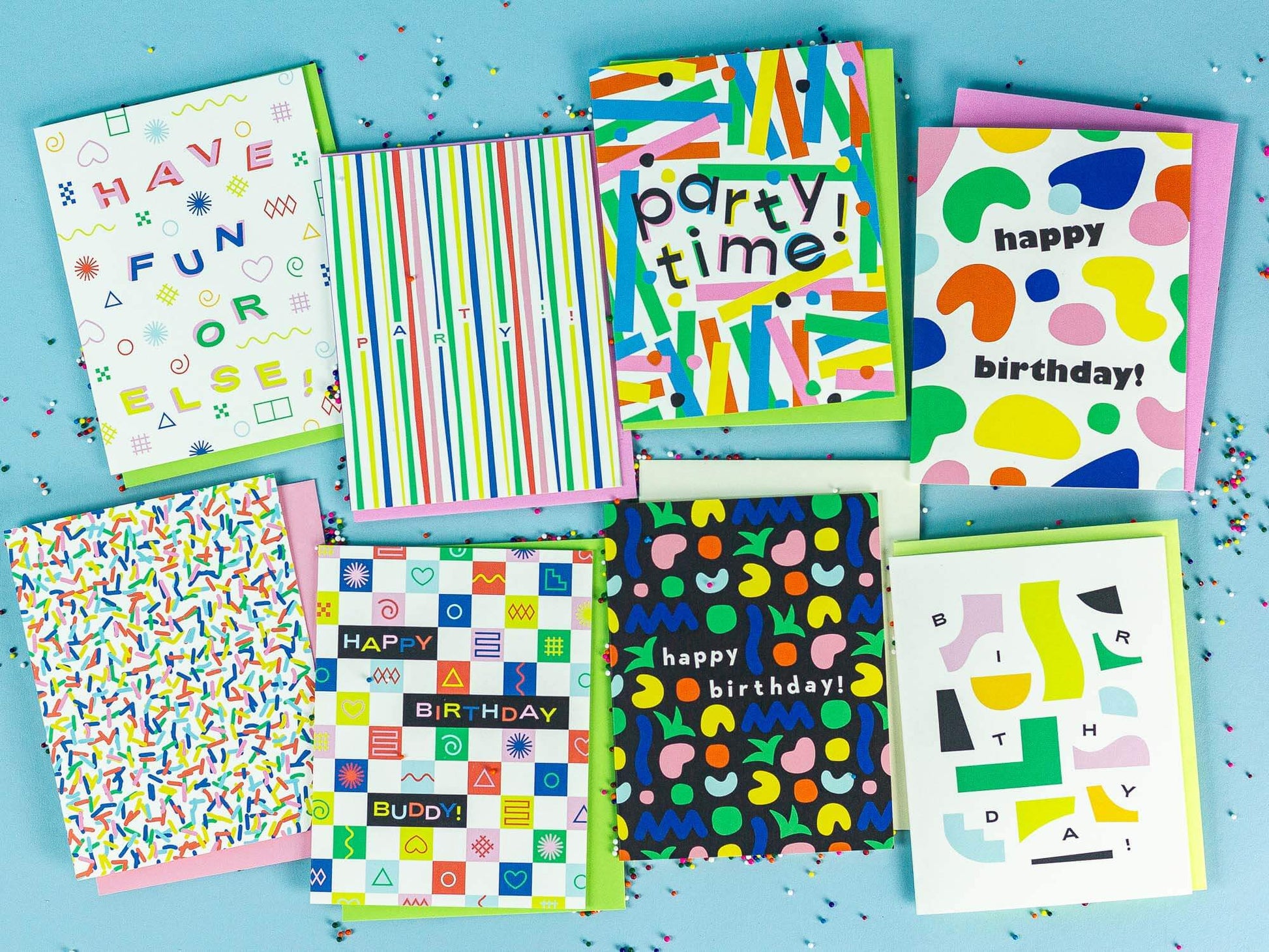 Collection of colorful birthday cards on a blue background