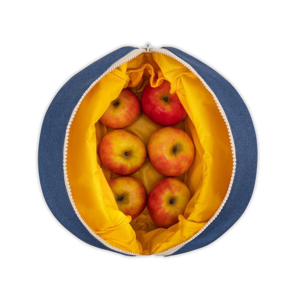 Blue and yellow bag with apples on a white background