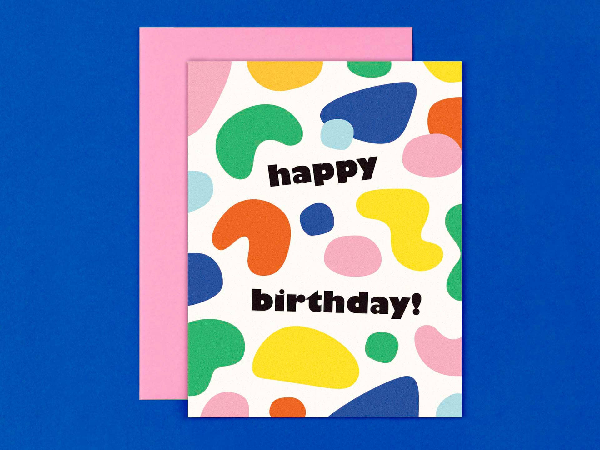 Colorful birthday card with abstract shapes on a blue background