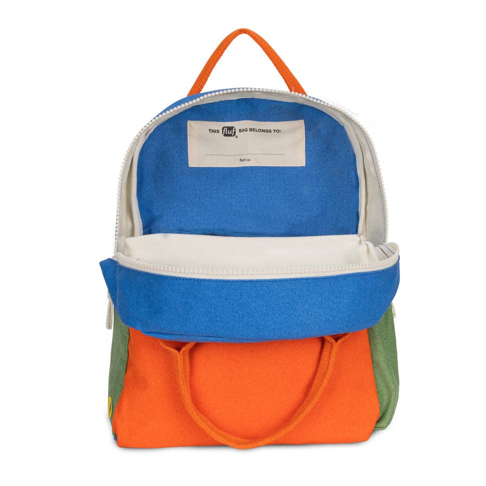 Colorful backpack with blue, orange, and green sections on a white background