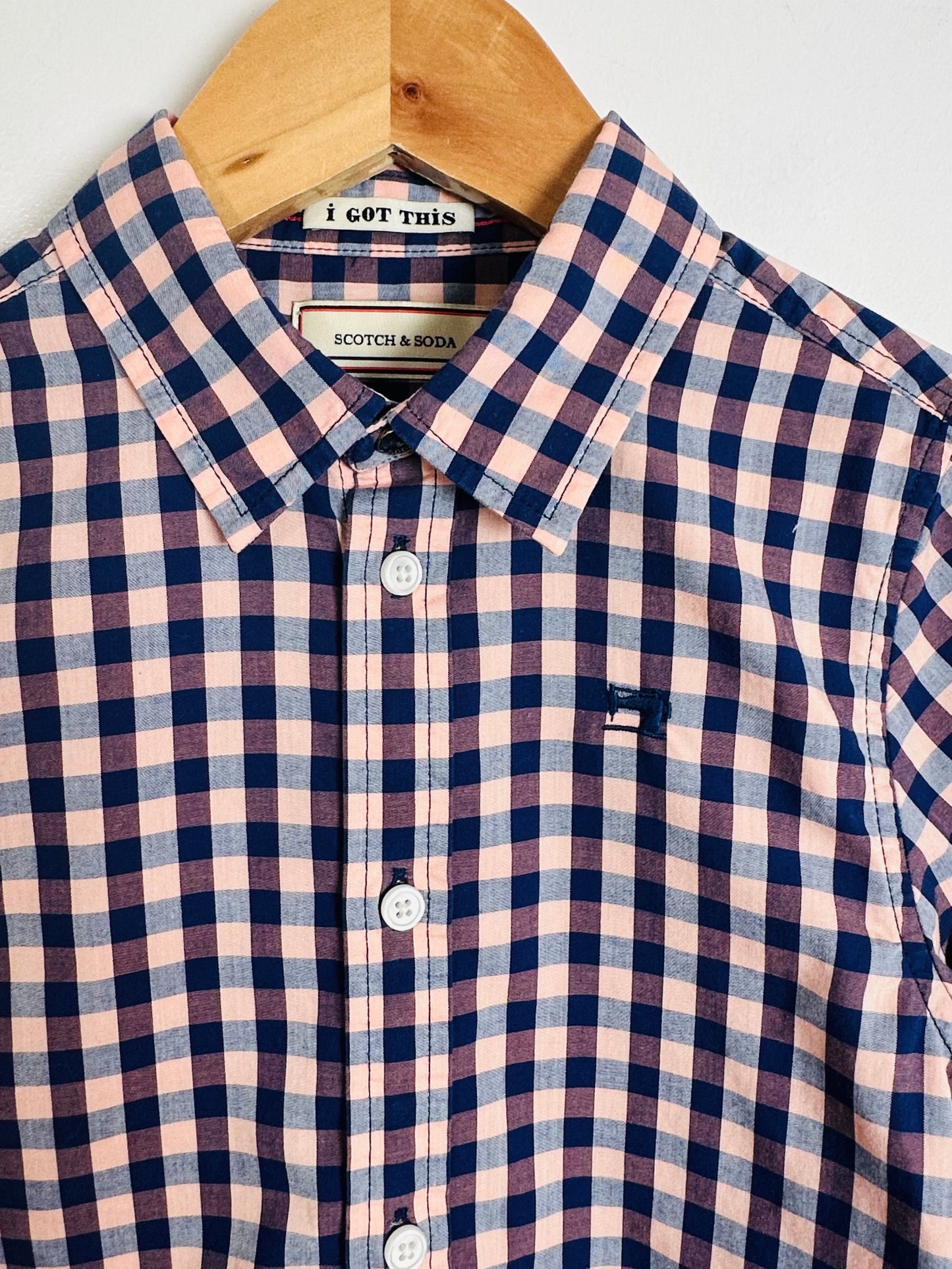 Plaid shirt on a hanger with 'I Got This' and Scotch & Soda labels.