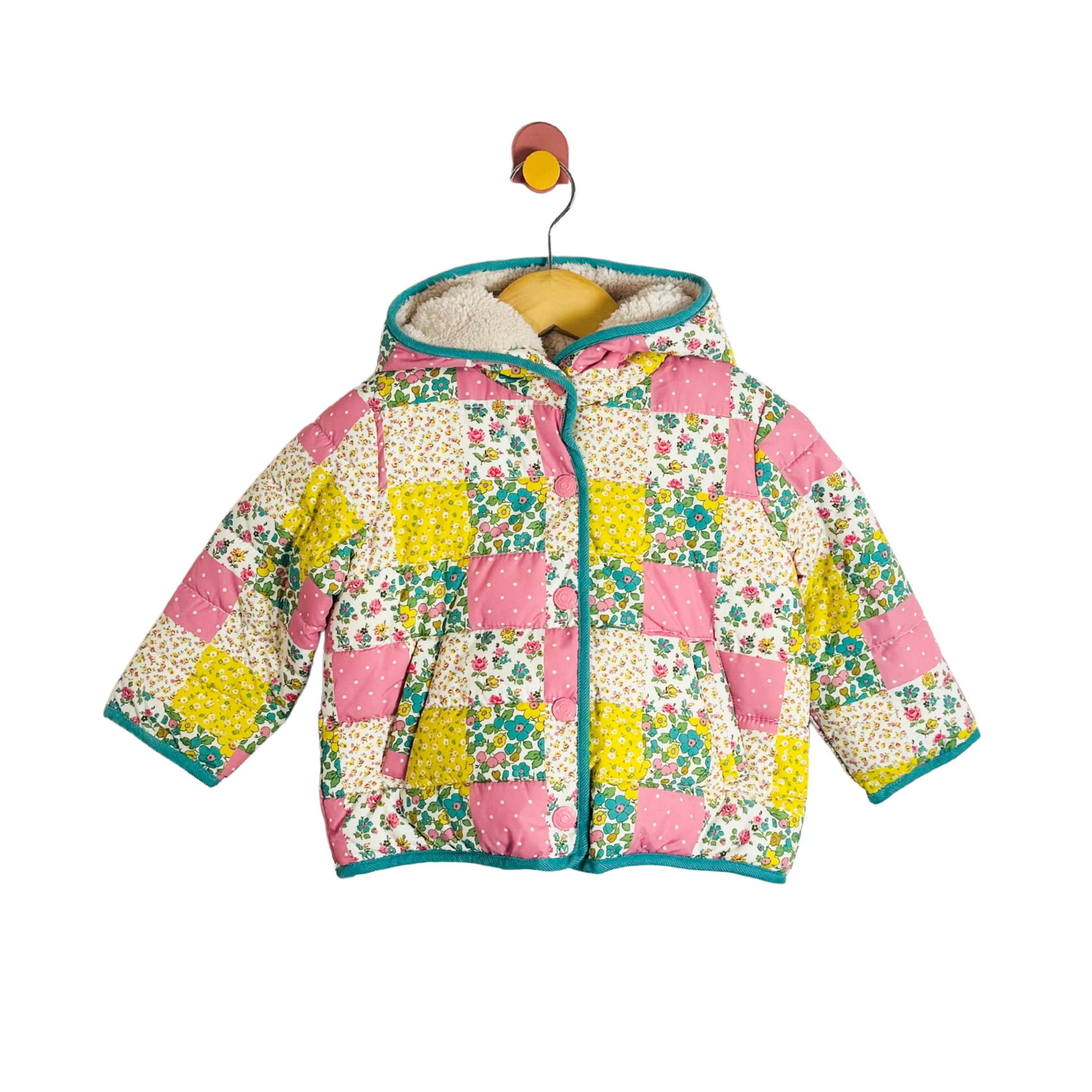 Floral quilted jacket on a white background