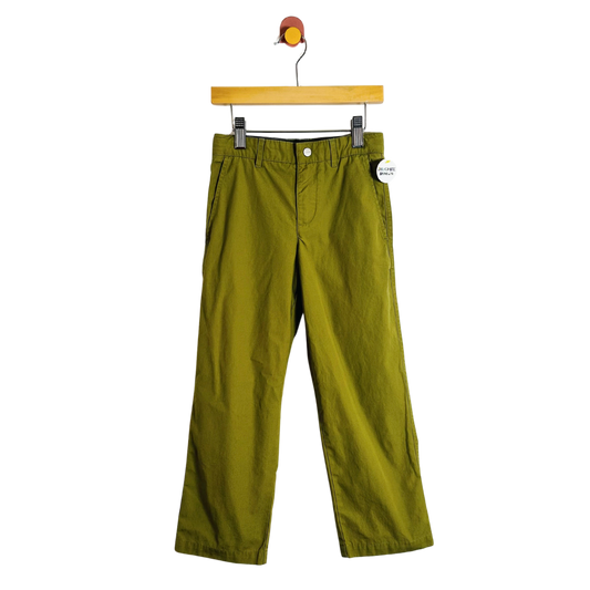 Green pants on a hanger with a white background