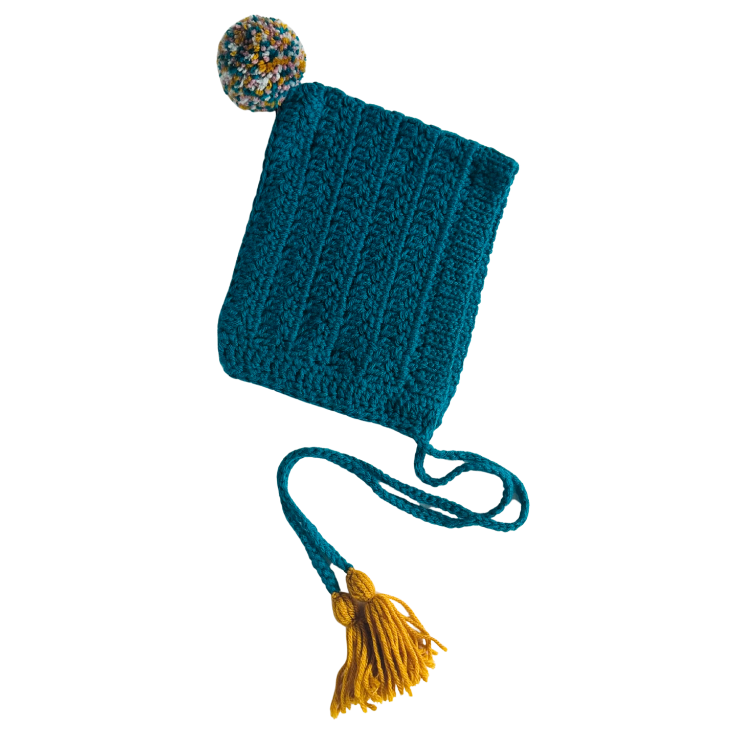 Blue knitted bonnet with a yellow tassel on a white background