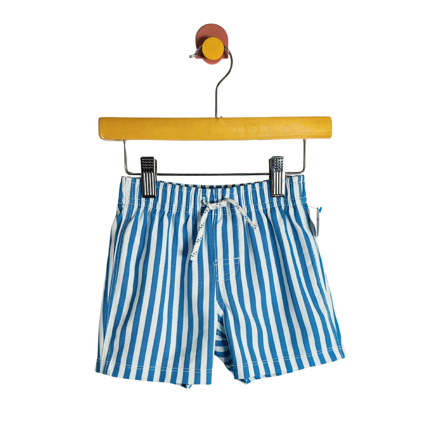 Blue and white striped shorts on a hanger against a white background