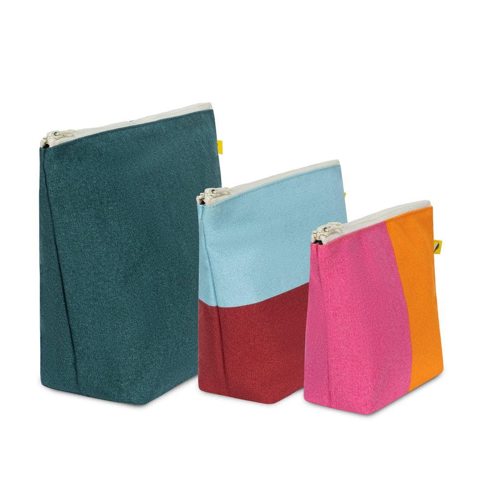 Three colorful pouches with zippers on a white background