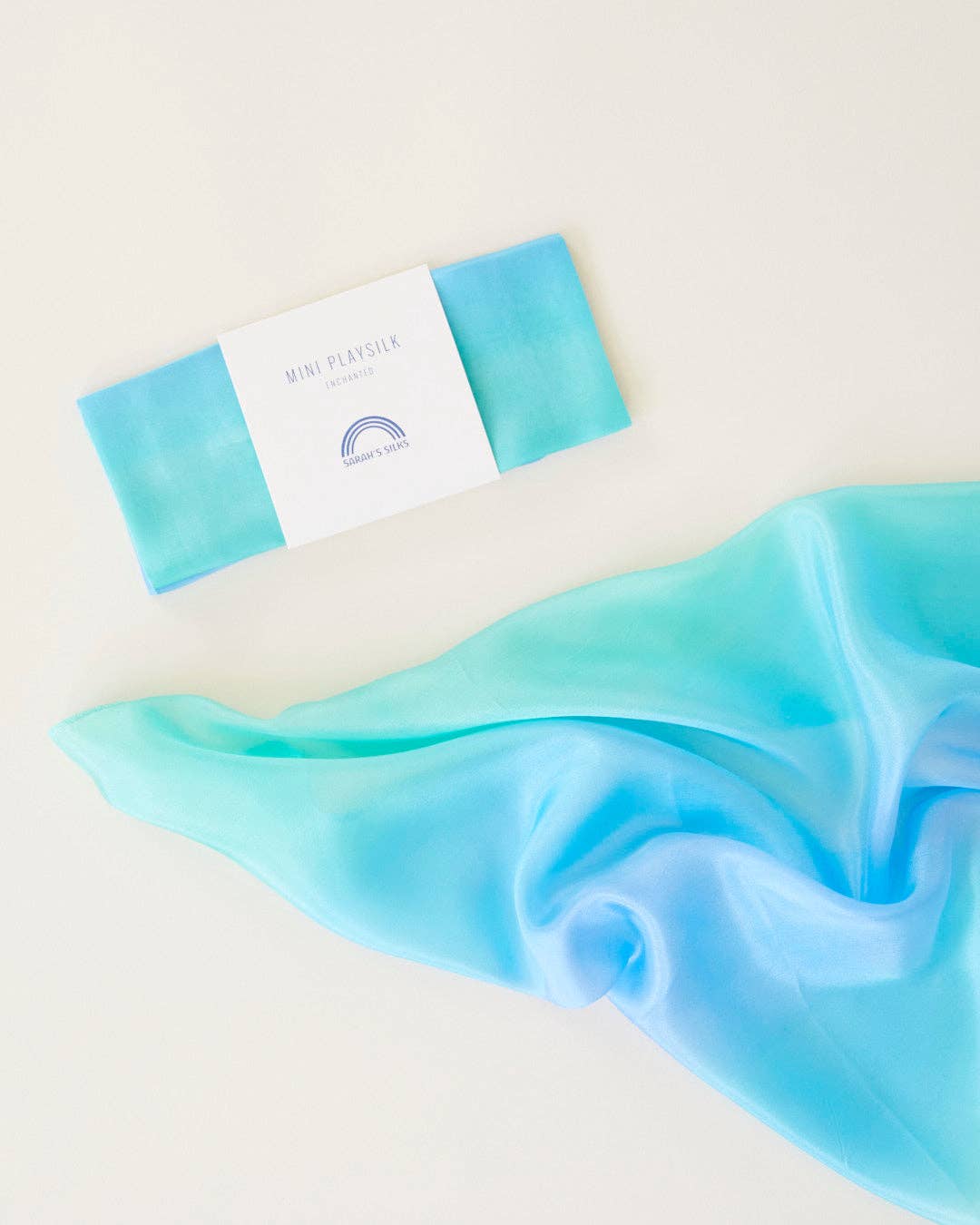 Blue fabric with a brand label on a white background
