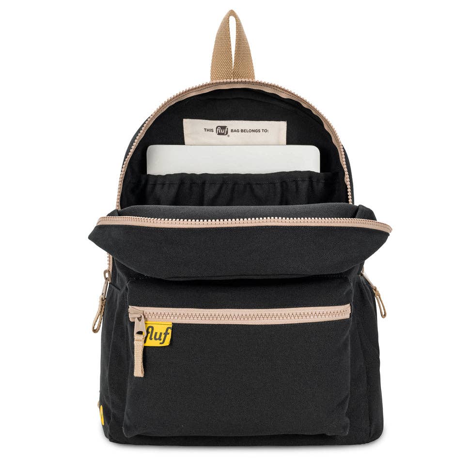 Black backpack with beige accents and a visible brand logo on a white background