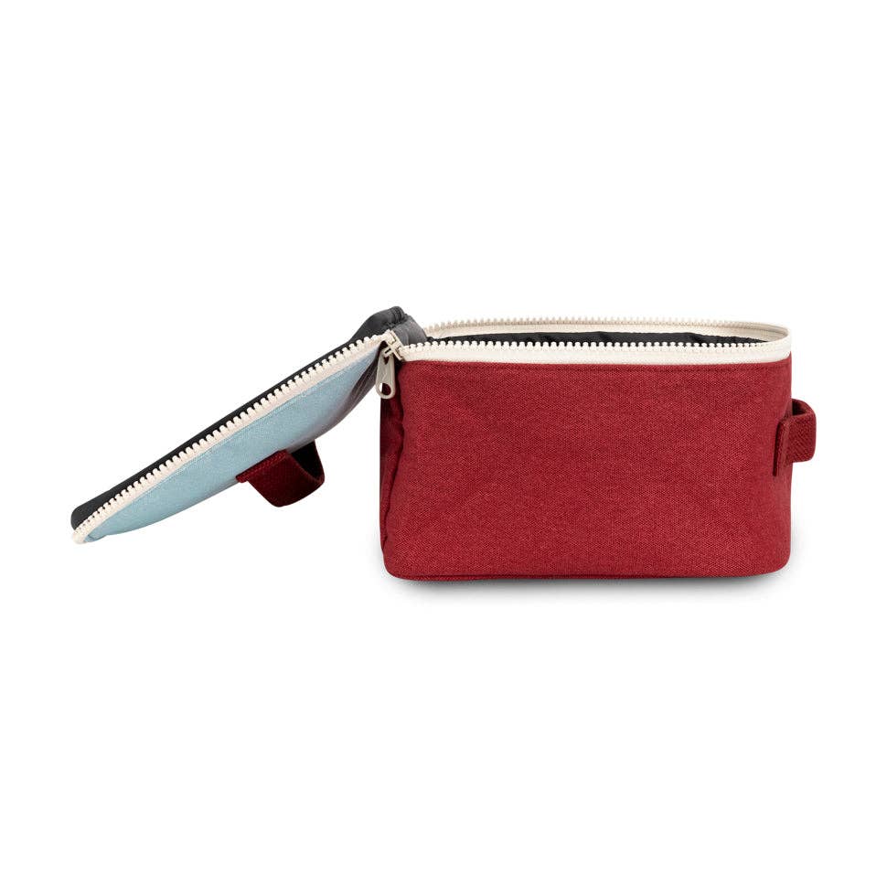 Red pouch with a blue zipper on a white background