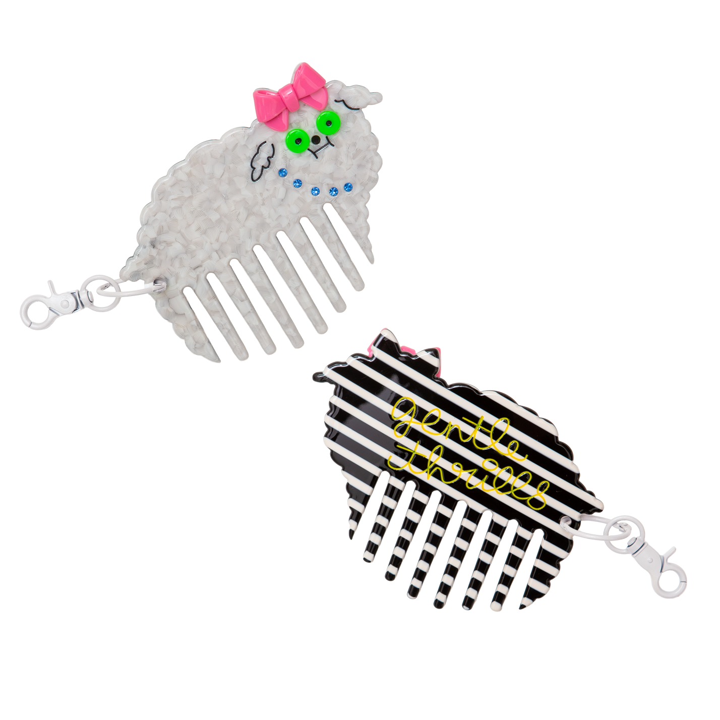 Two decorative hair combs with cartoon character designs on a white background