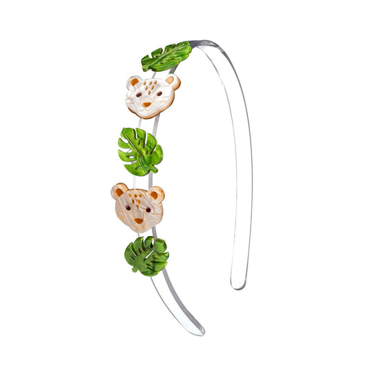 Headband with leopard and leaf designs on a white background