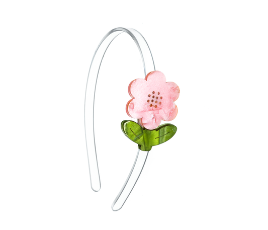 Flower-shaped hair accessory on a white background