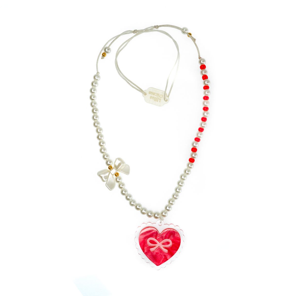 Necklace with a heart-shaped pendant and red beads on a white background