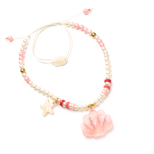 Beaded necklace with shell and starfish charms on a white background