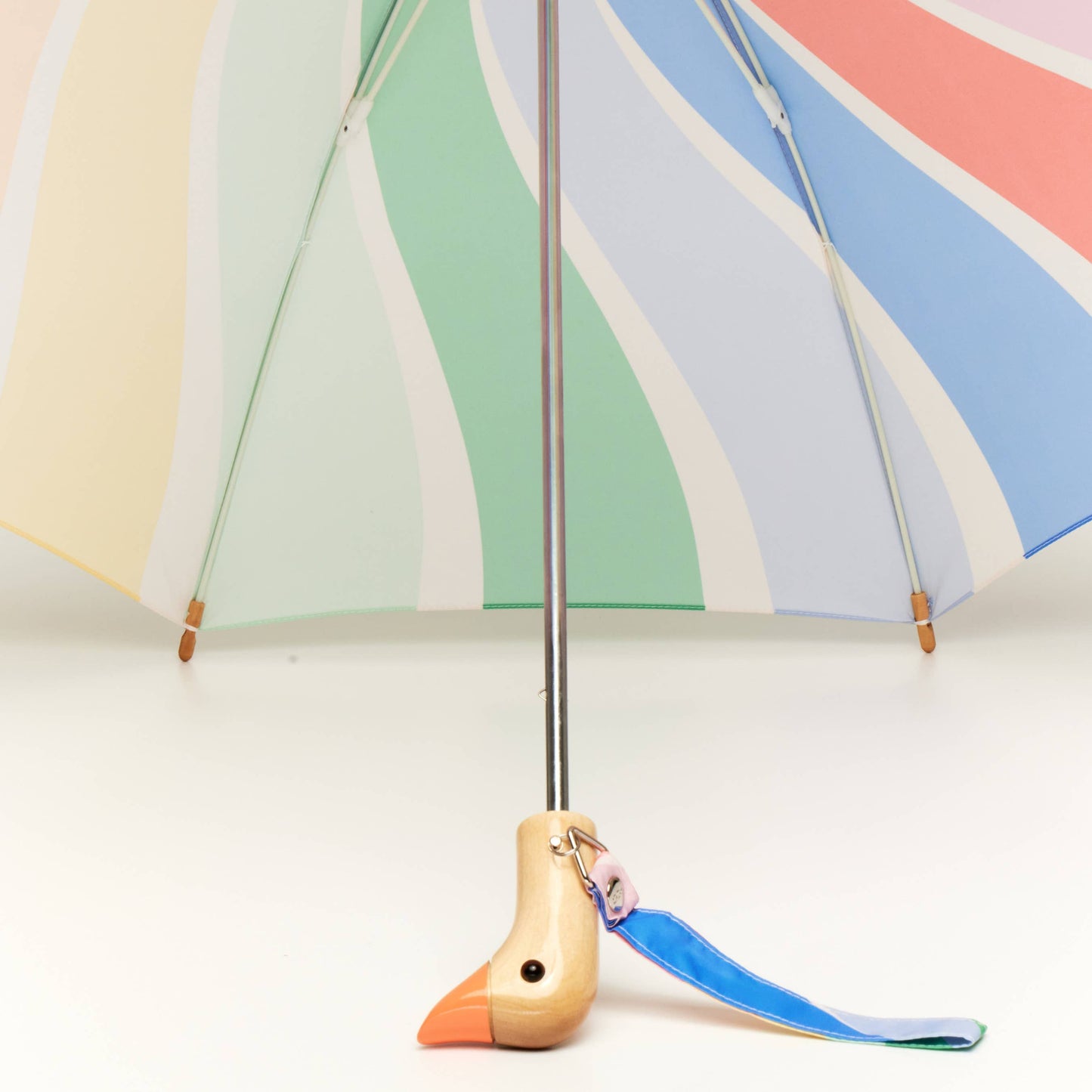Colorful umbrella with a wooden handle