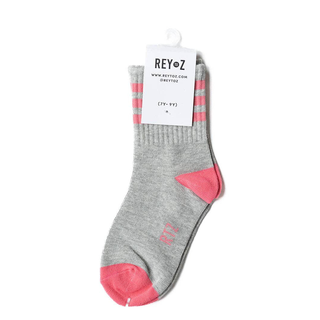 Gray sock with pink accents on a white background, featuring a REY•OZ label.