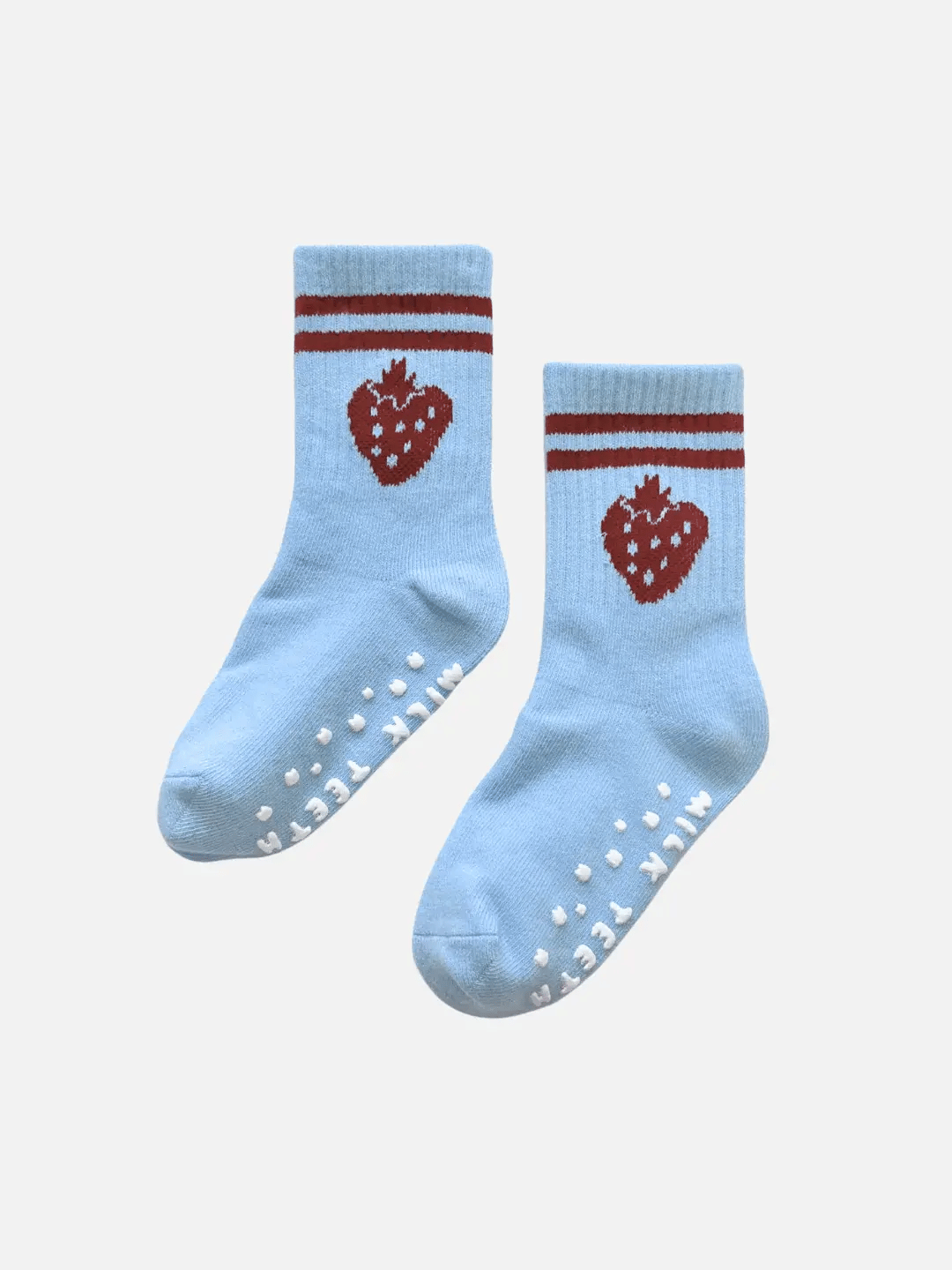 Pair of light blue socks with red strawberry design and white sole on a white background