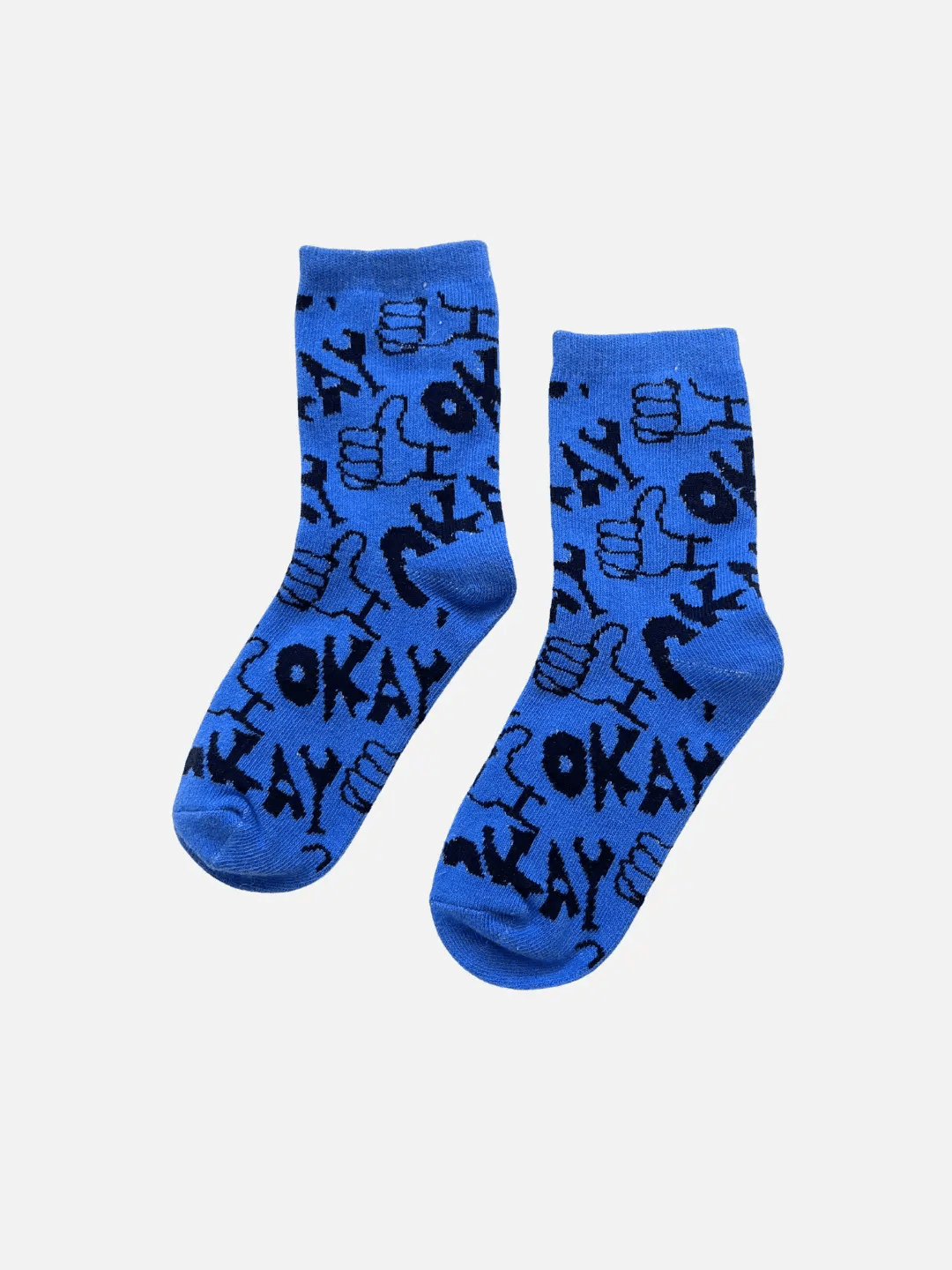Blue socks with black text and graphics on a light gray background
