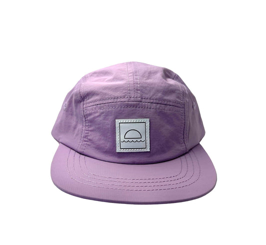 Purple cap with a logo on a white background