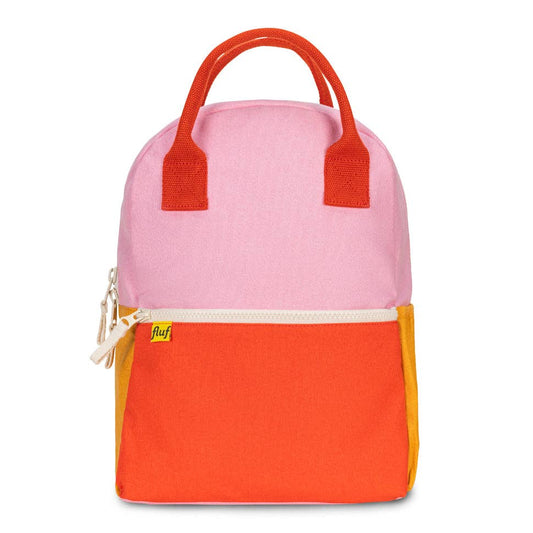 Pink and orange backpack with a visible brand logo on a white background