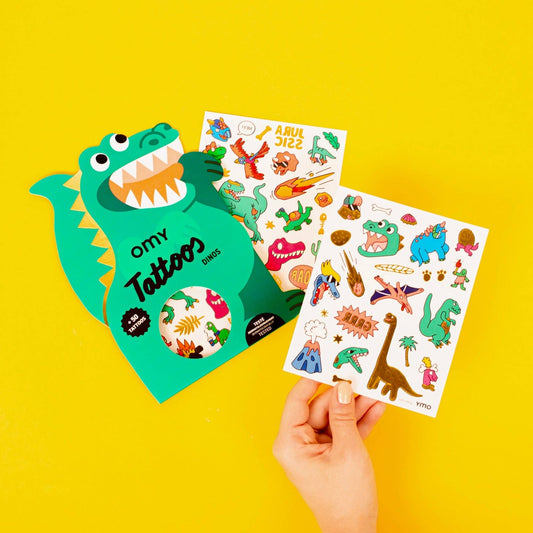 Children's tattoo book with dinosaur design on a yellow background