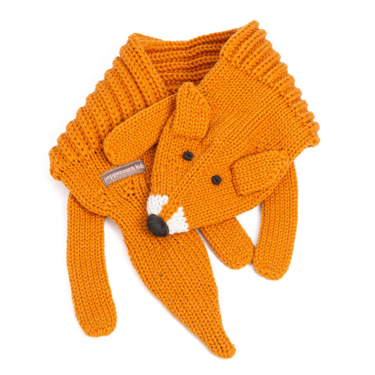 Knitted fox scarf on a white background