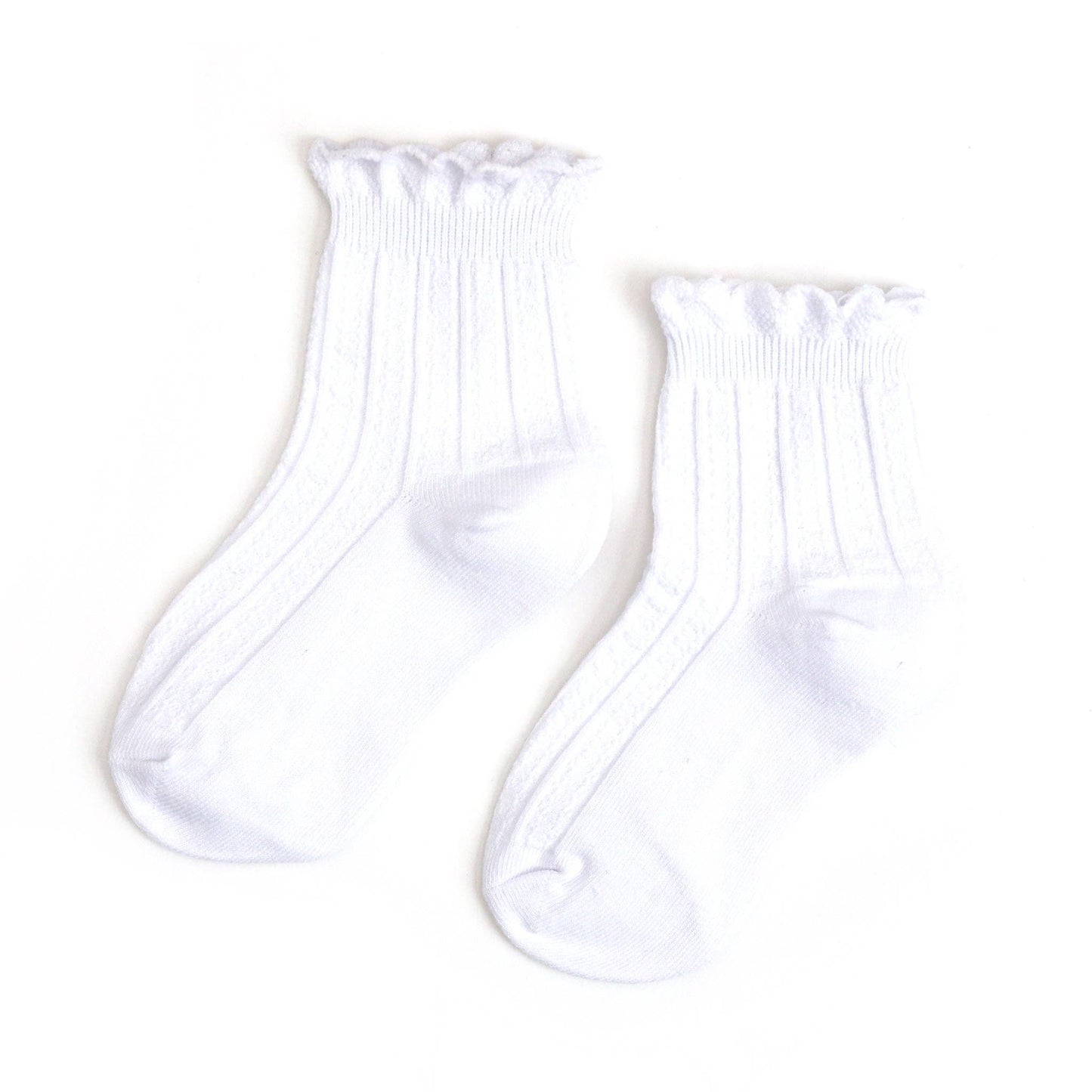 Pair of white socks on a white background