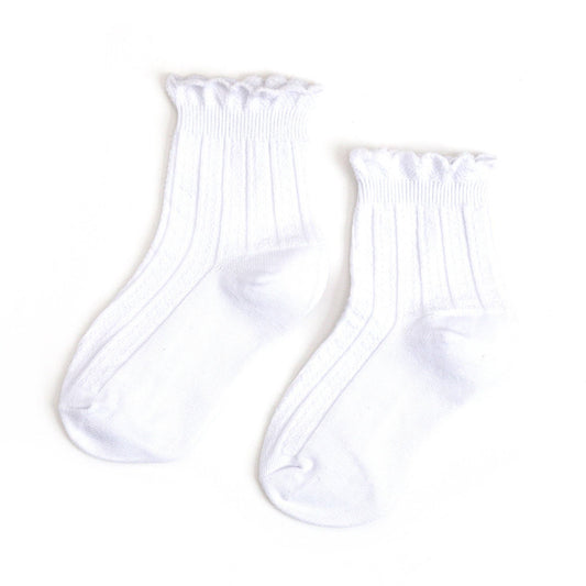 Pair of white socks on a white background