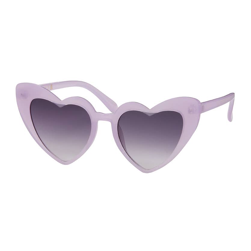 Heart-shaped sunglasses with a translucent light purple frame and gradient gray lenses, shown on a plain white background.