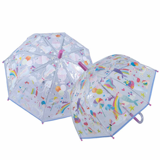 Two transparent umbrellas with colorful unicorn and rainbow patterns on a white background