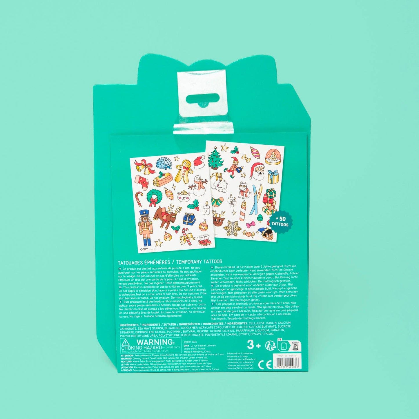 Packaging of Christmas-themed temporary tattoos with a green background