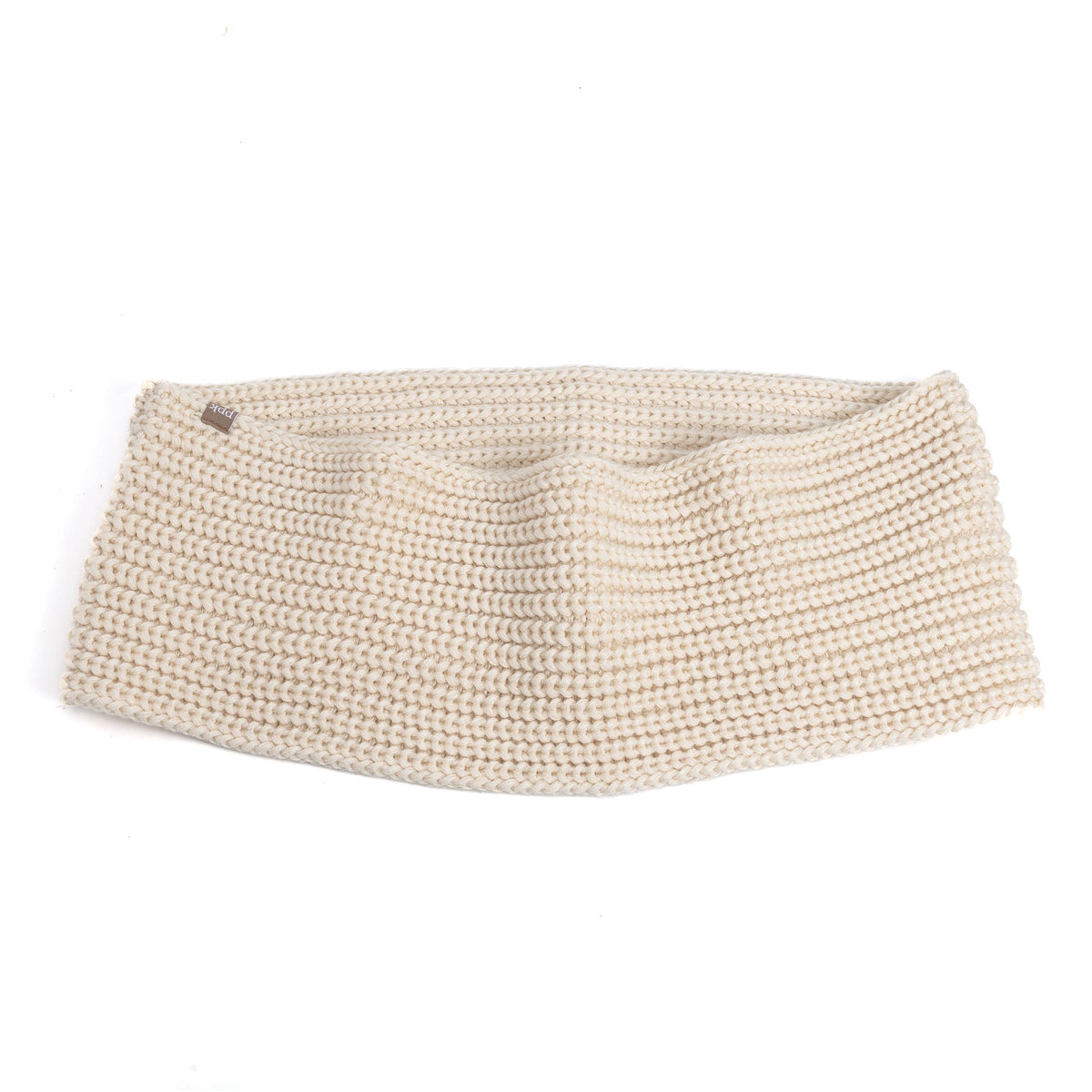 A chunky knit beige scarf with a small dark brand tag on the left side, photographed on a seamless white background.