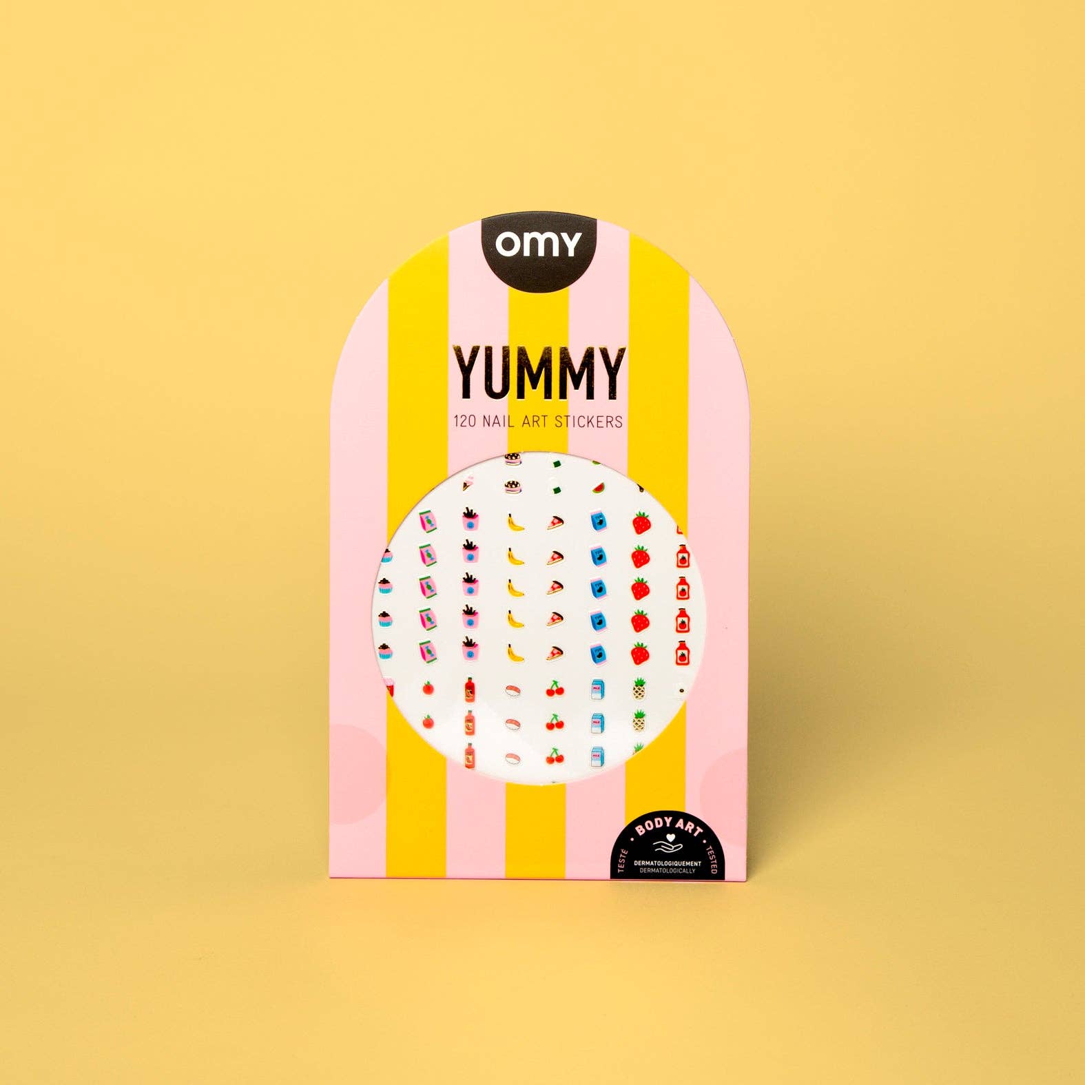 Packaging of OMY Yummy nail art stickers on a yellow background