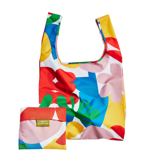 Colorful floral-patterned reusable bag with a small pouch on a white background