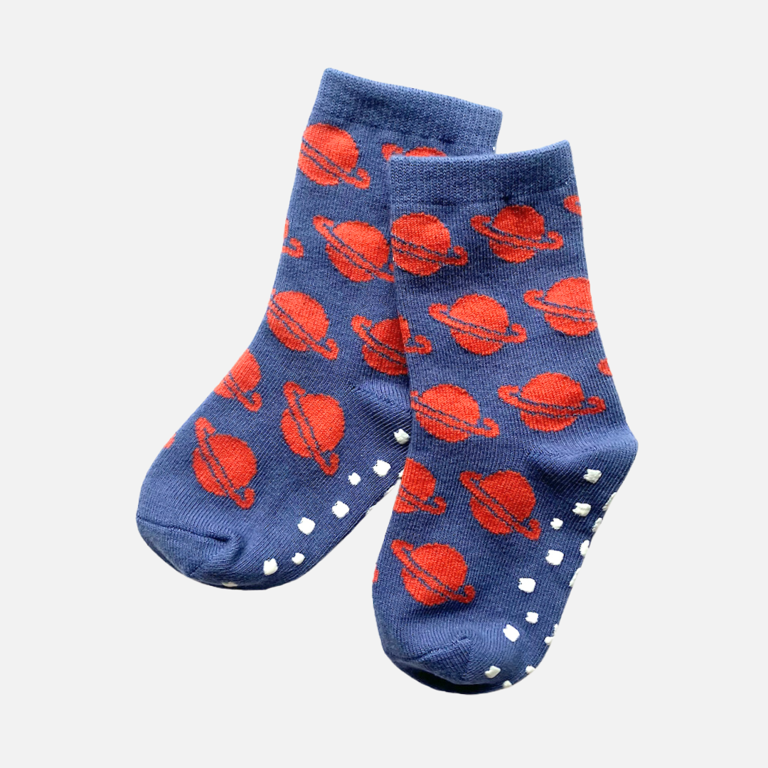 Blue socks with red planet pattern on a white background