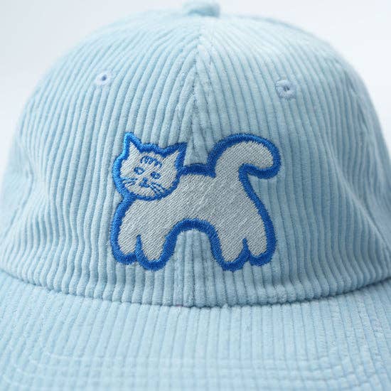 Light blue cap with a cat embroidered on it against a light blue background