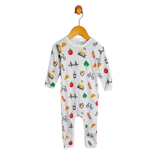 Baby onesie with colorful patterns on a hanger against a white background