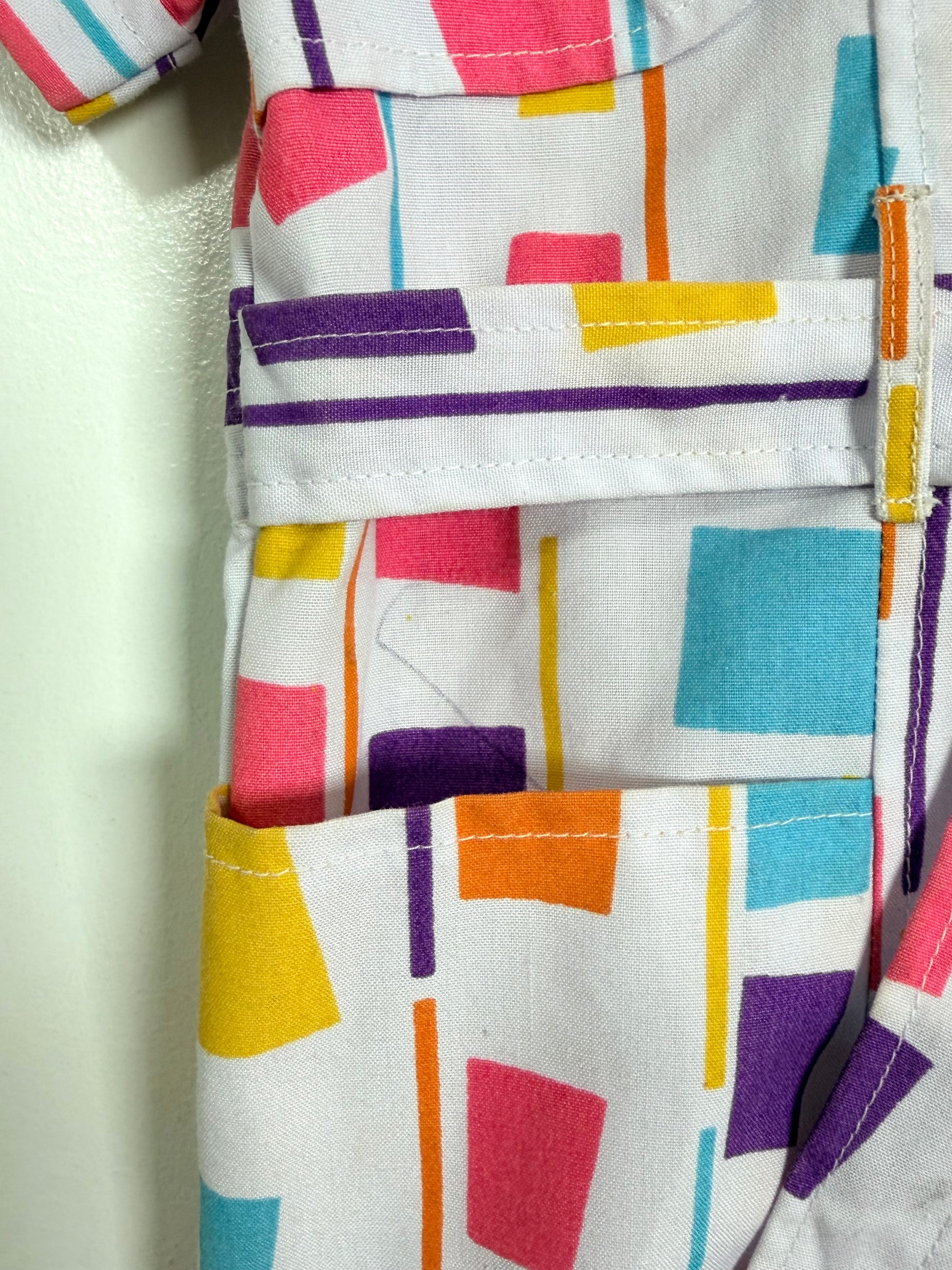 Close-up of a colorful geometric pattern on fabric