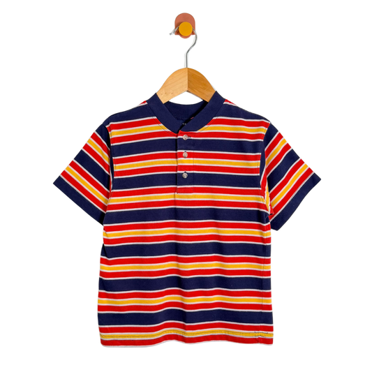 Colorful striped polo shirt on a wooden hanger against a white background