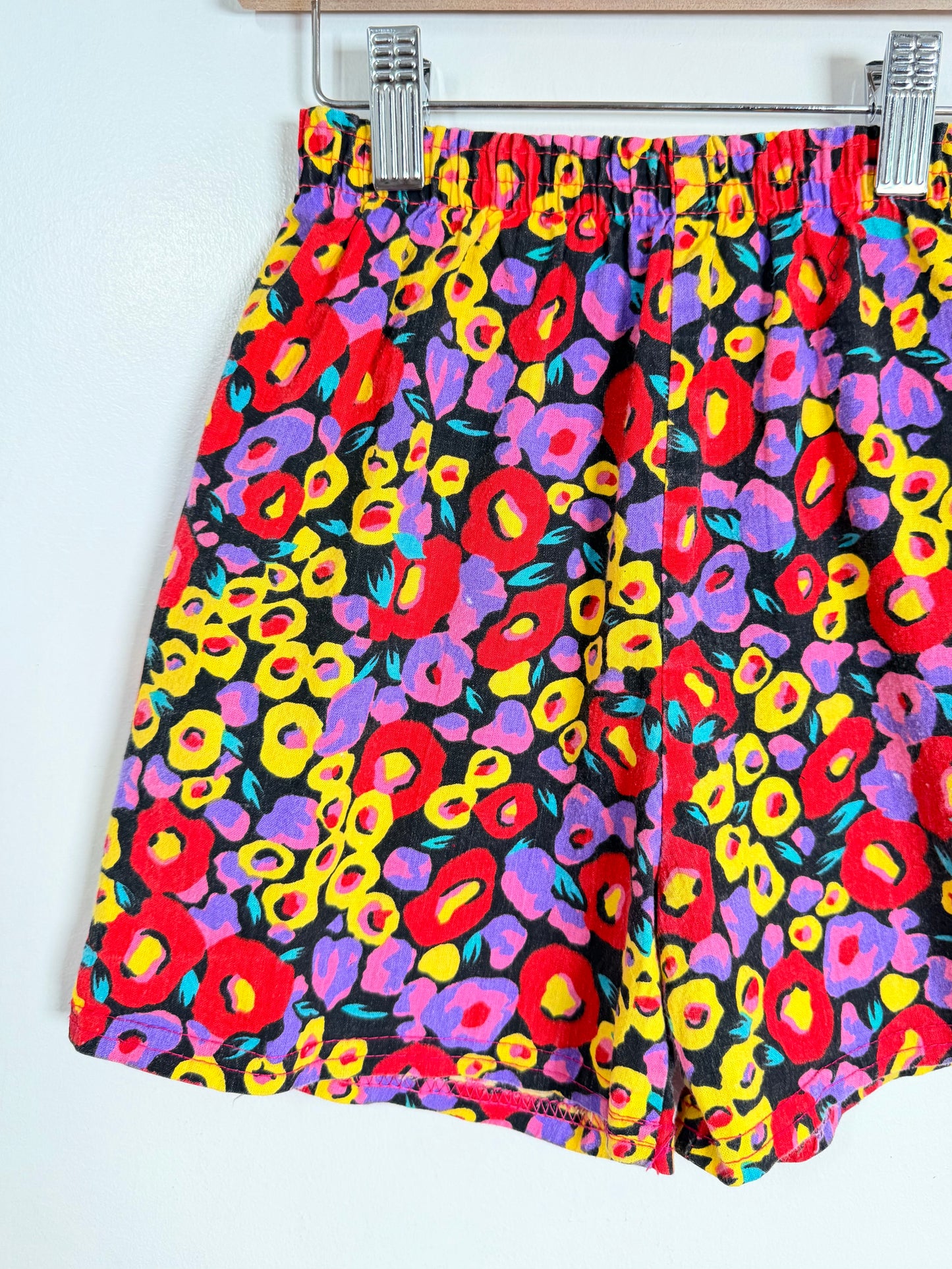 Colorful patterned shorts on a white background