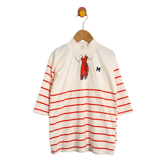White shirt with red stripes on a hanger against a white background