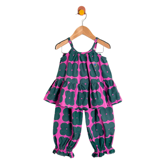 Children's floral outfit on a hanger against a white background