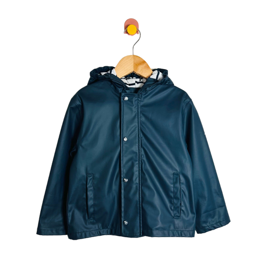 Blue raincoat on a wooden hanger against a white background