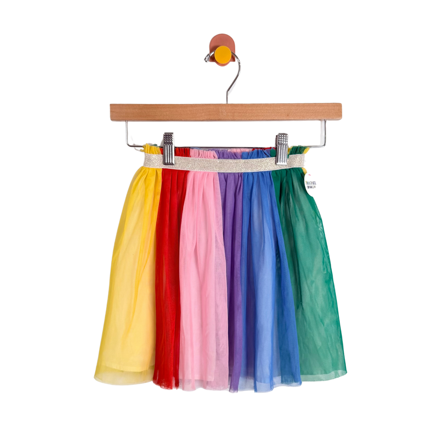 Colorful tulle skirt on a hanger against a white background