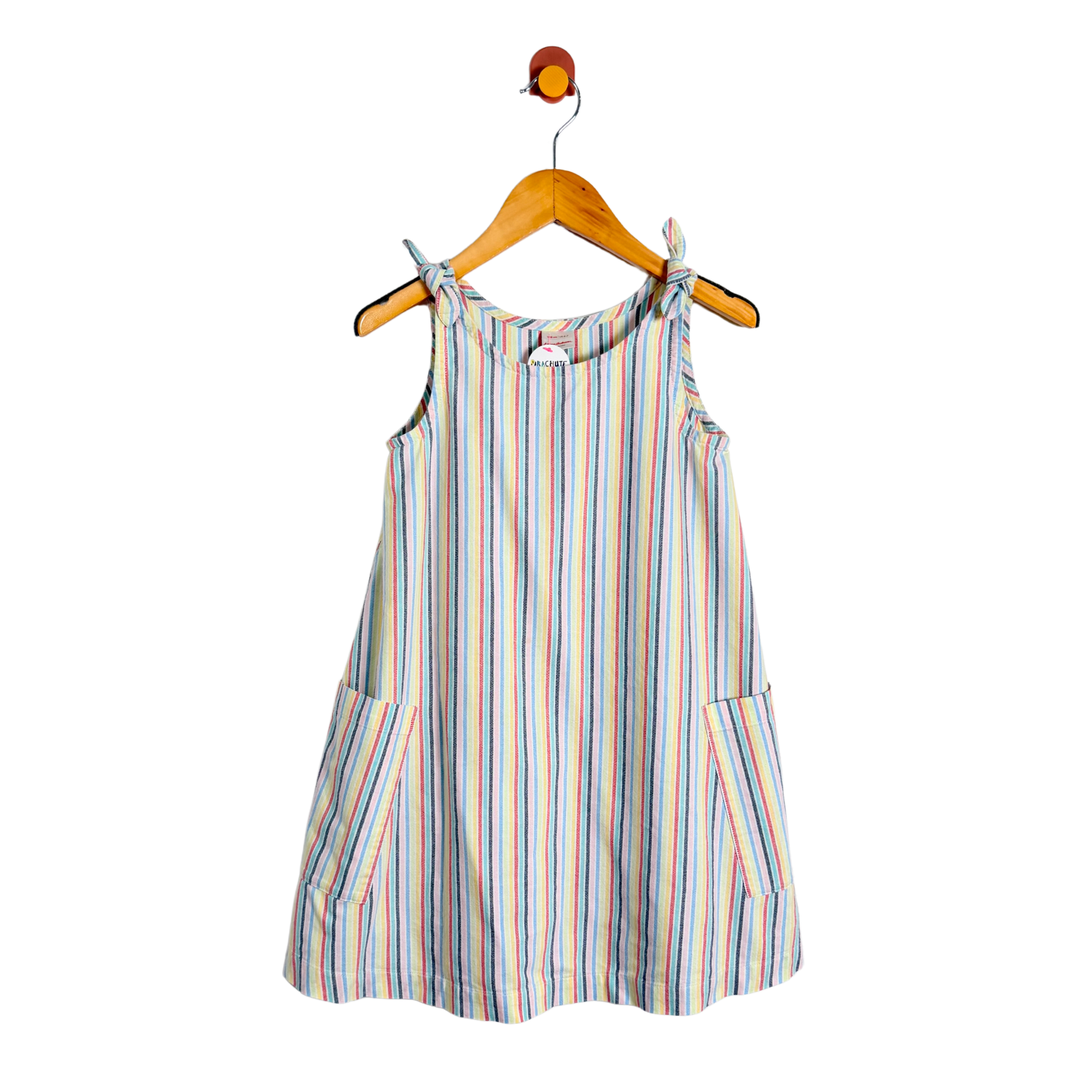 Striped dress on a hanger against a white background