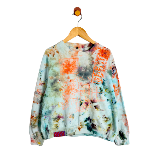 Colorful tie-dye sweatshirt on a wooden hanger against a white background