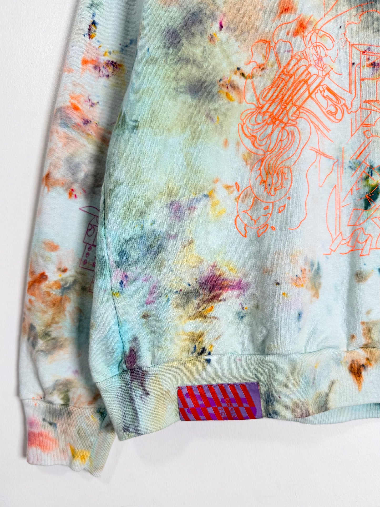 Colorful abstract patterned fabric with artistic design on a white background