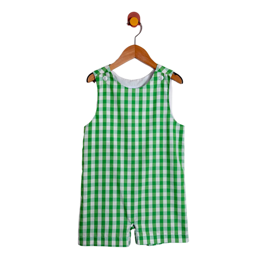 Green checkered romper on a hanger against a white background