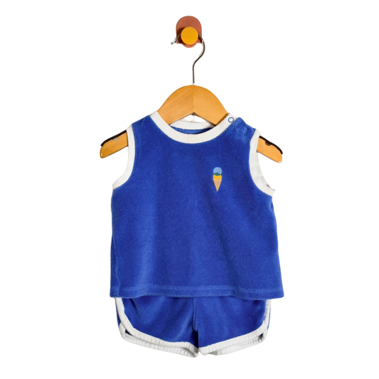 Blue sleeveless top and shorts set on a hanger against a white background